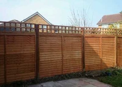 Decorative horizontal slat fencing for modern garden design